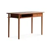Stylish home office desk with drawer and open shelf.