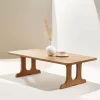 Natural Wood Coffee Table with curved legs and smooth surface