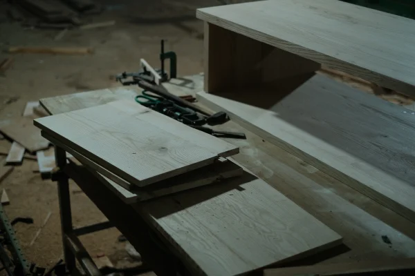 Mid century entry table under construction in a woodworking shop