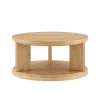 Elegant round coffee table with a spacious surface and open storage shelf