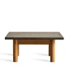 Rustic Modern Coffee Table with textured tabletop and cylindrical legs