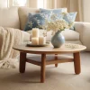 Low round coffee table in a minimalist Japandi-style living room
